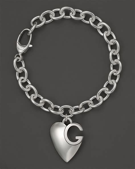 gucci sterling silver charm|gucci heart bracelet with trademark.